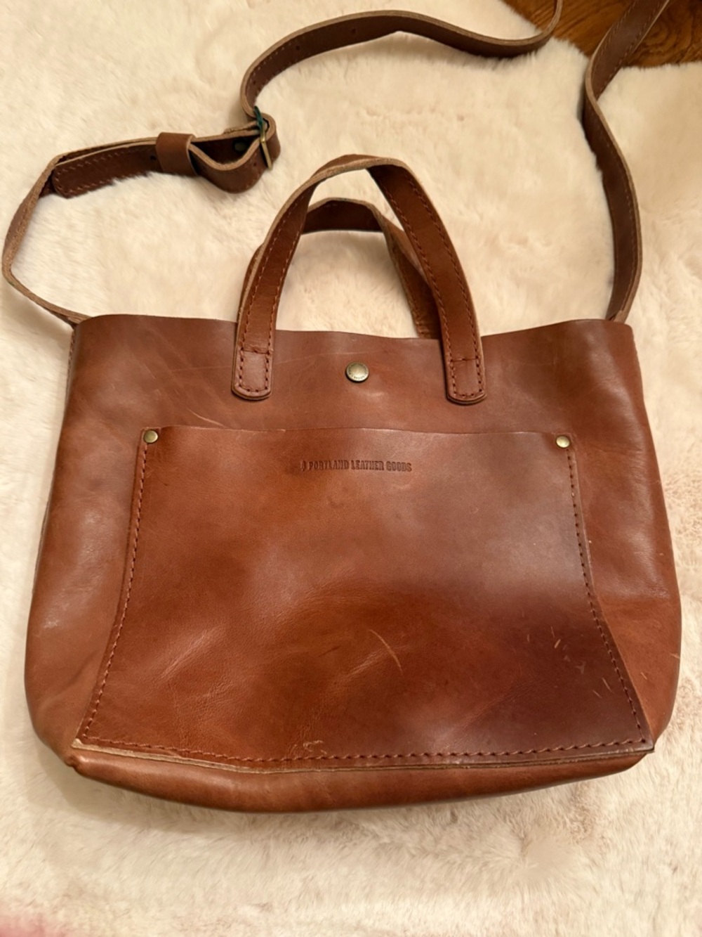 Portland Leather Brown Leather Tote Bag with Front Pocket and removable strap.